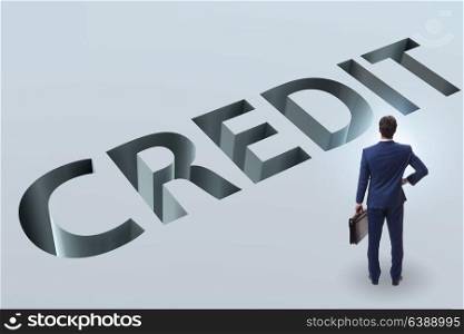 Businessman falling into trap of borrowing debt and credit