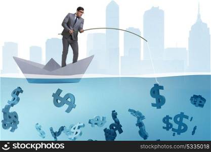 Businessman fishing dollars money from paper boat ship