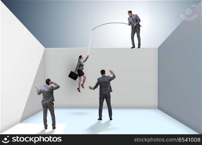 Businessman fishing his colleague in business concept