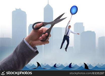 Businessman flying holding balloon