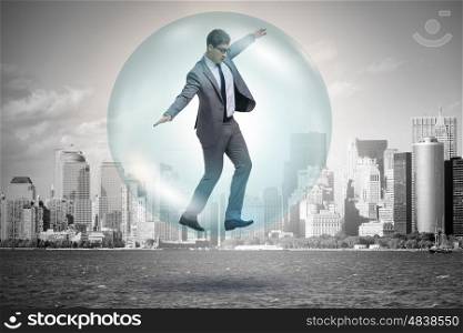 Businessman flying inside the bubble
