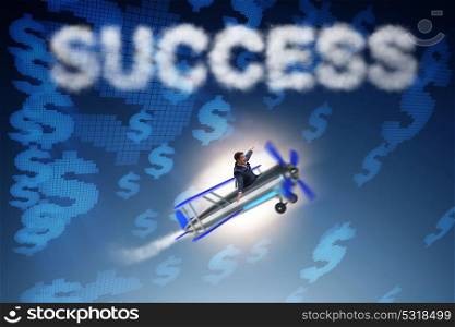 Businessman flying on airplane in success concept