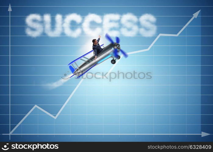 Businessman flying on airplane in success concept