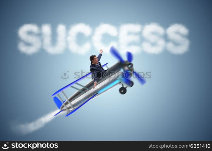 Businessman flying on airplane in success concept