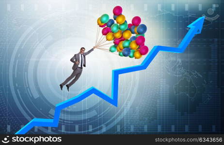 Businessman flying on balloons over graph