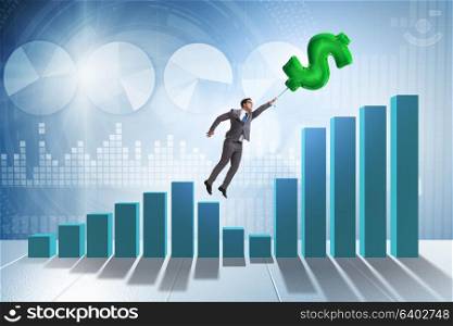 Businessman flying on dollar sign inflatable balloon over financials charts. Businessman flying on dollar sign inflatable balloon over financ