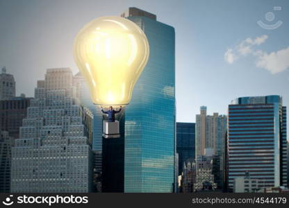 Businessman flying on hot balloon