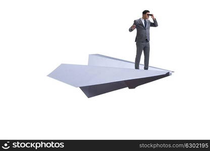 Businessman flying on paper plane in business concept