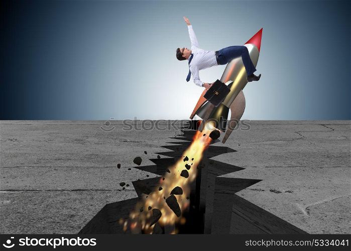 Businessman flying on rocket from rock gap