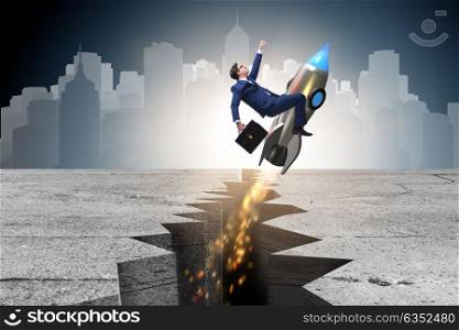 Businessman flying on rocket from rock gap