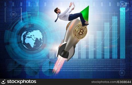 Businessman flying on rocket in bitcoin price rising concept