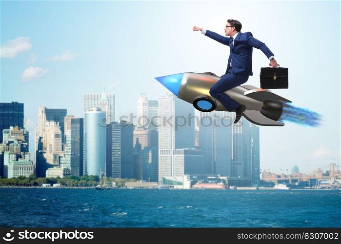 Businessman flying on rocket in business concept