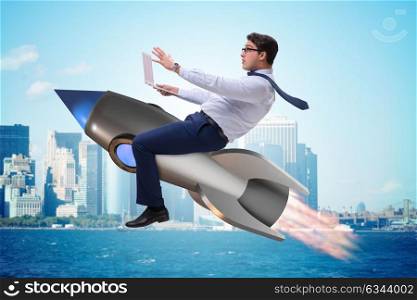 Businessman flying on rocket in business concept