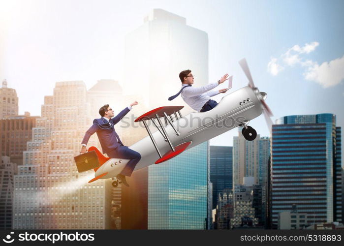 Businessman flying on vintage old airplane