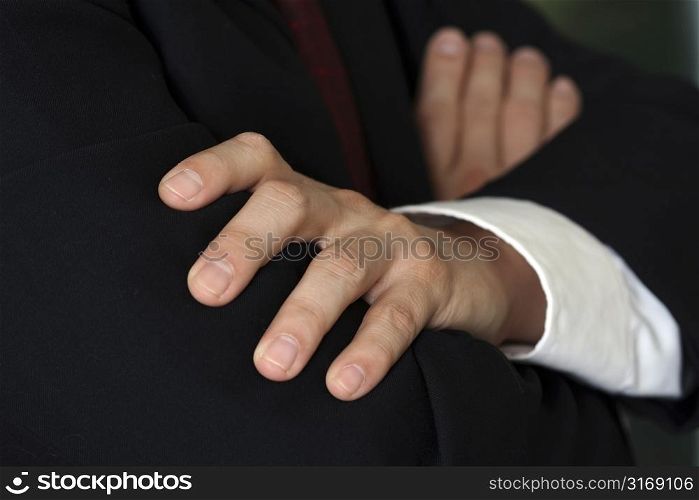 Businessman folding hands