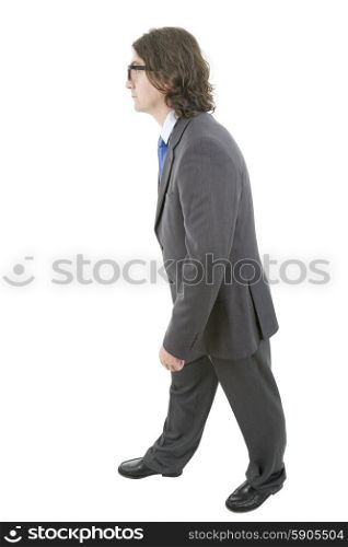 businessman full length walking, isolated on white