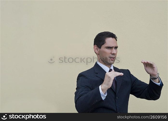 Businessman gesturing
