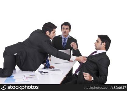 Businessman getting violent with fellow businessman