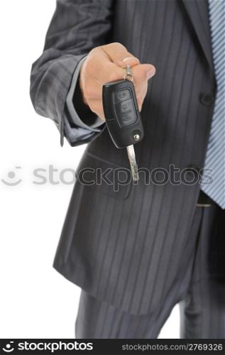 Businessman gives the keys to the car. Isolated on white