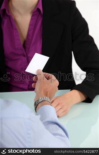 businessman giving his business card