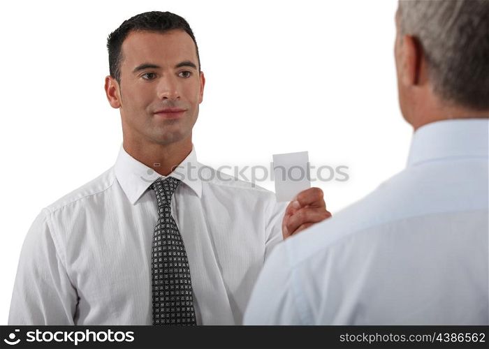 Businessman giving his card