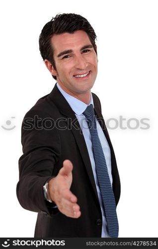 businessman giving his hand for a handshake
