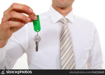 Businessman giving key