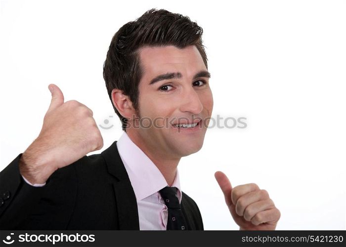 Businessman giving the thumbs up