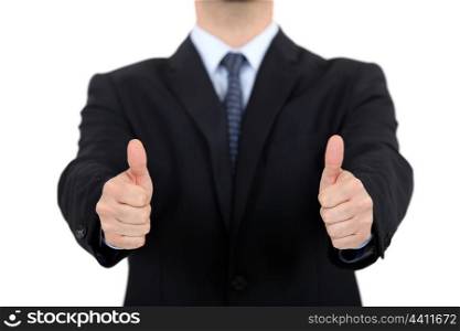 Businessman giving thumbs-up