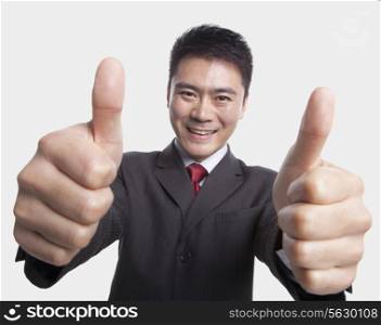 Businessman Giving Thumbs-Up