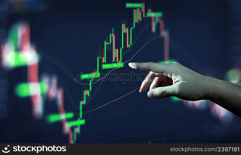 Businessman hand analysing financial stock market graph on board. Trading data index investment growth chart. Cryptocurrency and Forex Concept.