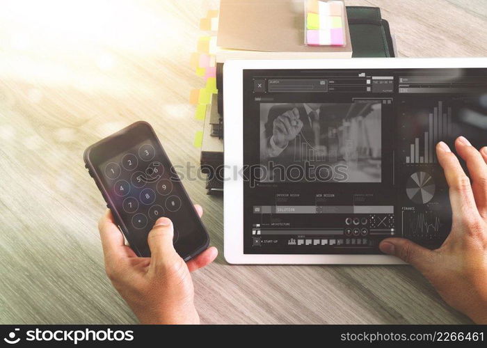 Businessman hand attending video conference with digital tablet computer and tablet computer at desk in office