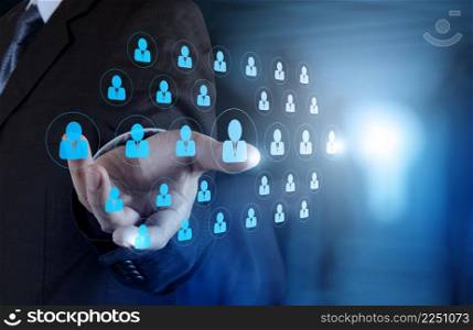 businessman hand choosing people icon as human resources concept 