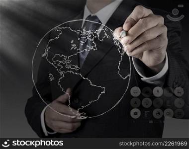 businessman hand drawing abstract globe on virtual screen