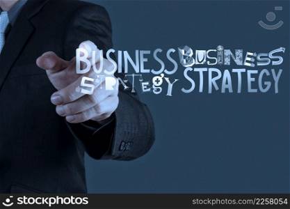 businessman hand drawing business strategy as concept