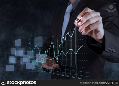 businessman hand drawing virtual chart business on texture background