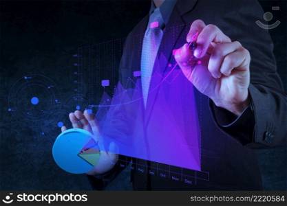businessman hand drawing virtual chart business on touch screen computer as concept