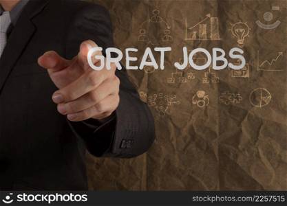 businessman hand draws great jobs words on crumpled recycle paper background as concept