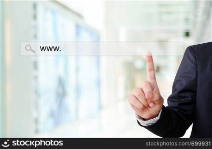 Businessman hand point address bar over blur background , business and technology concept, E-commerce