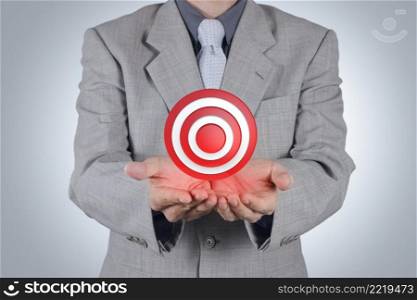 businessman hand pointing target symbol as success concept