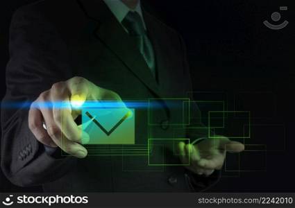 businessman hand pressing e-mail sign as concept 