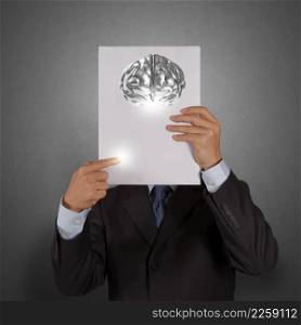 businessman hand show book of 3d metal brain as concept