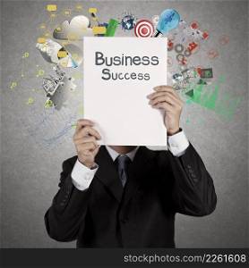 businessman hand show book of success business as concept