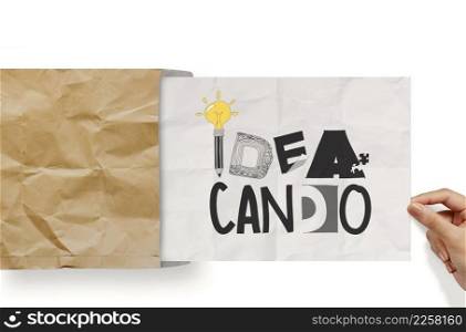businessman hand show design word IDEA CAN DO on crumpled paper as concept