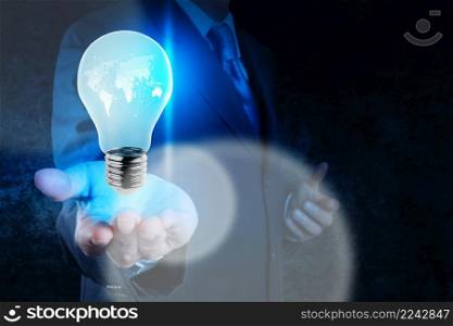 businessman hand showing light bulb with social network structure as concept