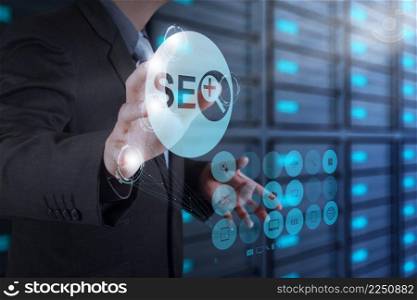 businessman hand showing search engine optimization SEO as concept 