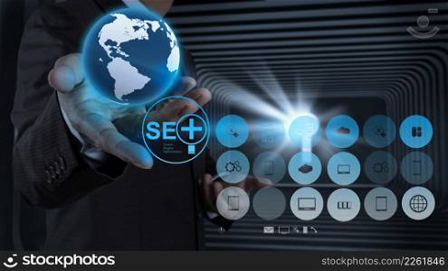 businessman hand showing search engine optimization SEO as concept