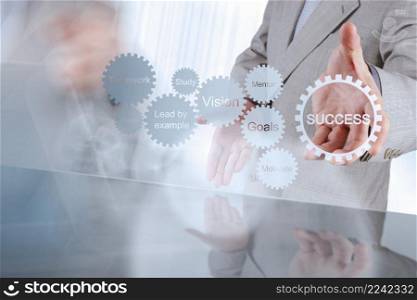 businessman hand shows gear business success chart concept