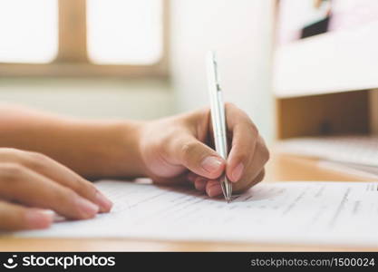 Businessman hand signing the document business contract agreement