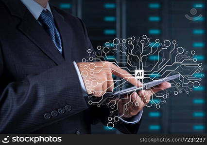 businessman hand using tablet computer and server room background